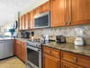 Your fully equipped kitchen features granite counters, stainless appliances, and everything you need to create memorable meals during your stay.