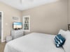 Drift off to sleep in your comfortable bedroom, complete with flatscreen TV and coastal touches for ultimate relaxation.
