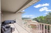 Relax on this spacious balcony with comfortable seating, where you can unwind while taking in beautiful views of the surrounding area.