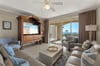 Relax in this elegant living room with ocean views from the private balcony.