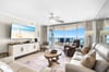 Relax in your oceanfront living room where floortoceiling windows frame endless sea views and your private balcony awaits.