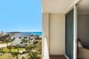 Step onto your private balcony and soak in stunning ocean views with turquoise waters stretching to the horizon.