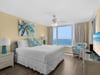 Bedroom 1 with King Bed and Access to Private Balcony