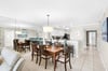 Your spacious openconcept dining and kitchen area features elegant seating for memorable meals together.
