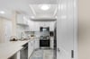 The gourmet kitchen sets the stage for delicious meals and cozy gatherings