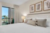 Wake up to ocean breezes and tropical views from the private balcony of the guest bedroom