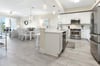 Your bright, openconcept kitchen and dining space invites you to gather, cook, and share meals, all while soaking in the coastal light and comfortable, modern finishes that make this home feel effort