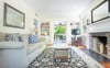 French doors open the living room to the private courtyard.