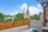 Perched above the trees, boasting views of Wesley Monumental United Methodist Church, Calhoun Square, and Talmadge Memorial Bridge.