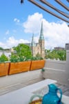 Perched above the trees, boasting views of Wesley Monumental United Methodist Church, Calhoun Square, and Talmadge Memorial Bridge.