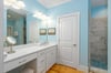 The primary ensuite bathroom is the epitome of luxury, with a spacious walkin shower, vanity and spacious walkin closet.