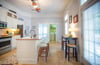 Both washer and dryer are located off the kitchen in the back of the home.