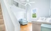 View of the stairs leading up to the washer and dryer.