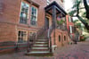 Lovely historical staircase leading up to the home.