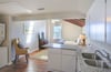 The skylight above the bedroom brings in lots of natural light.