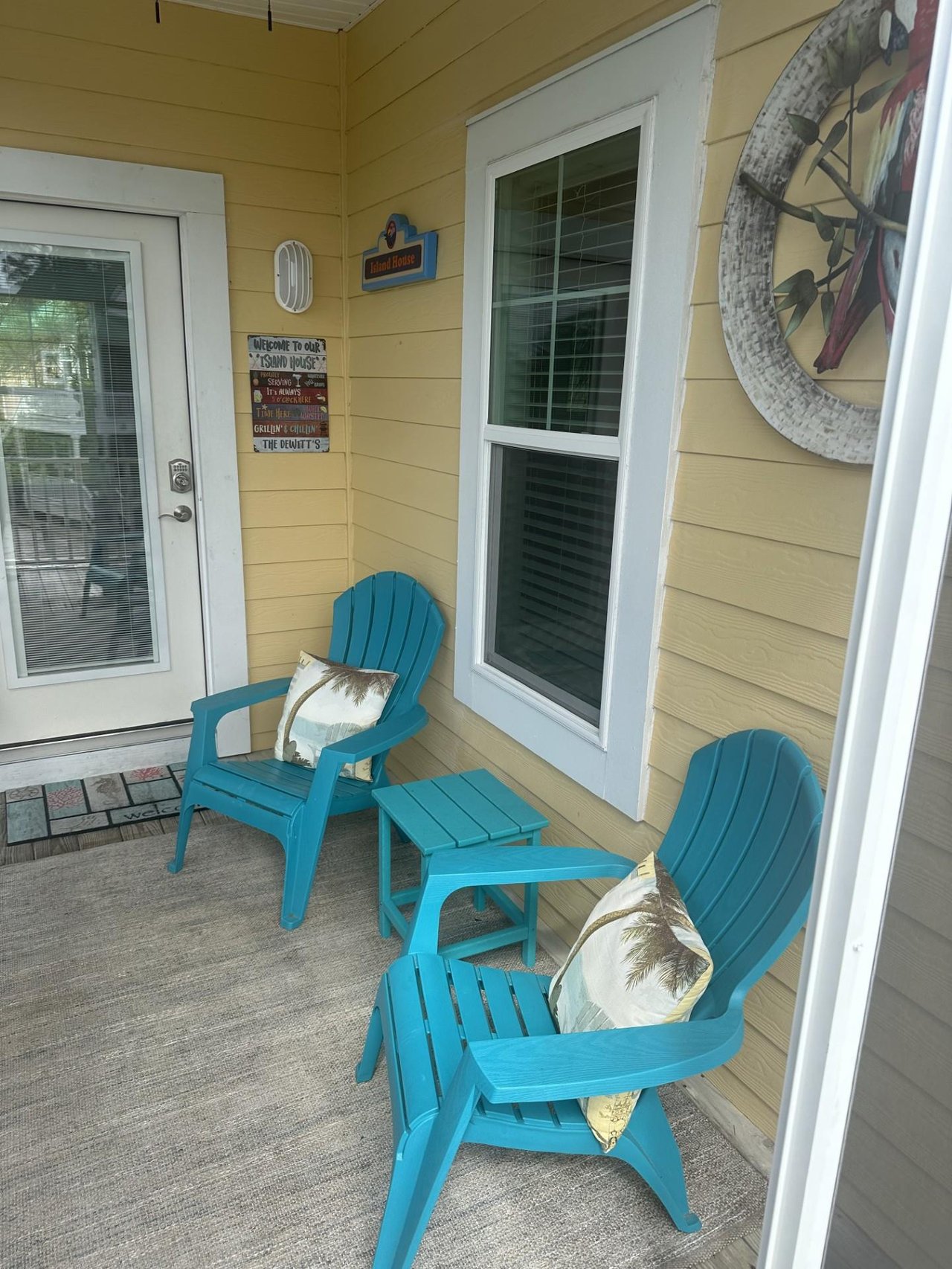 Welcome to the Island House. Come sit and sip on the screened porch