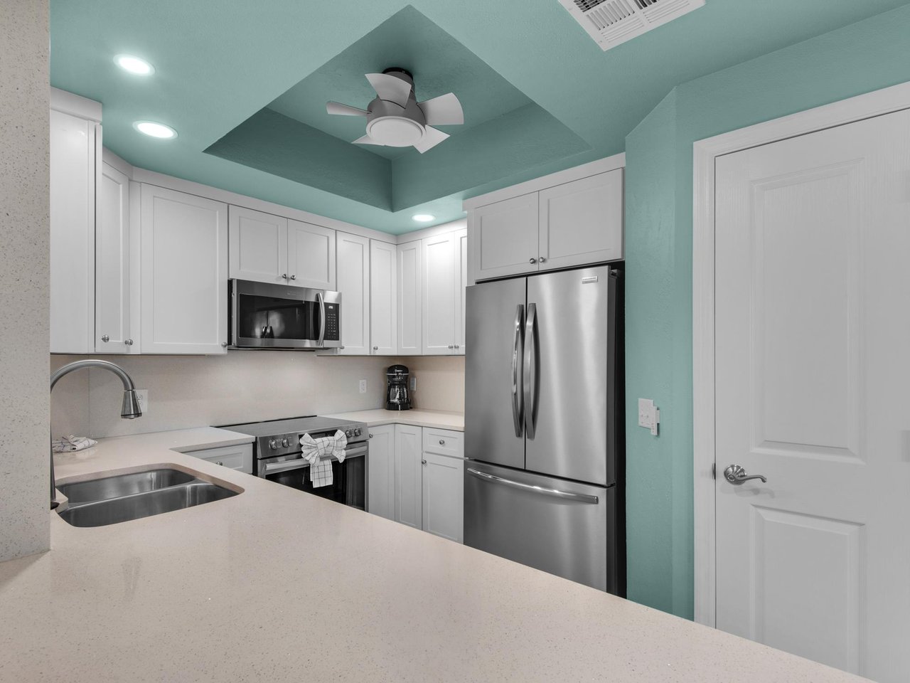 Fully Stocked Kitchen with Stainless Steel Appliances