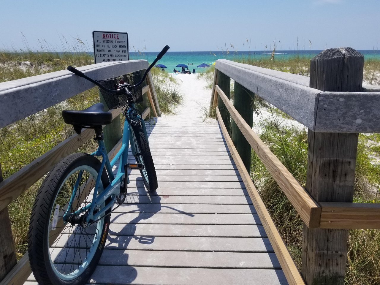 2120581 A Bicycle Parked On A Wooden Bridge