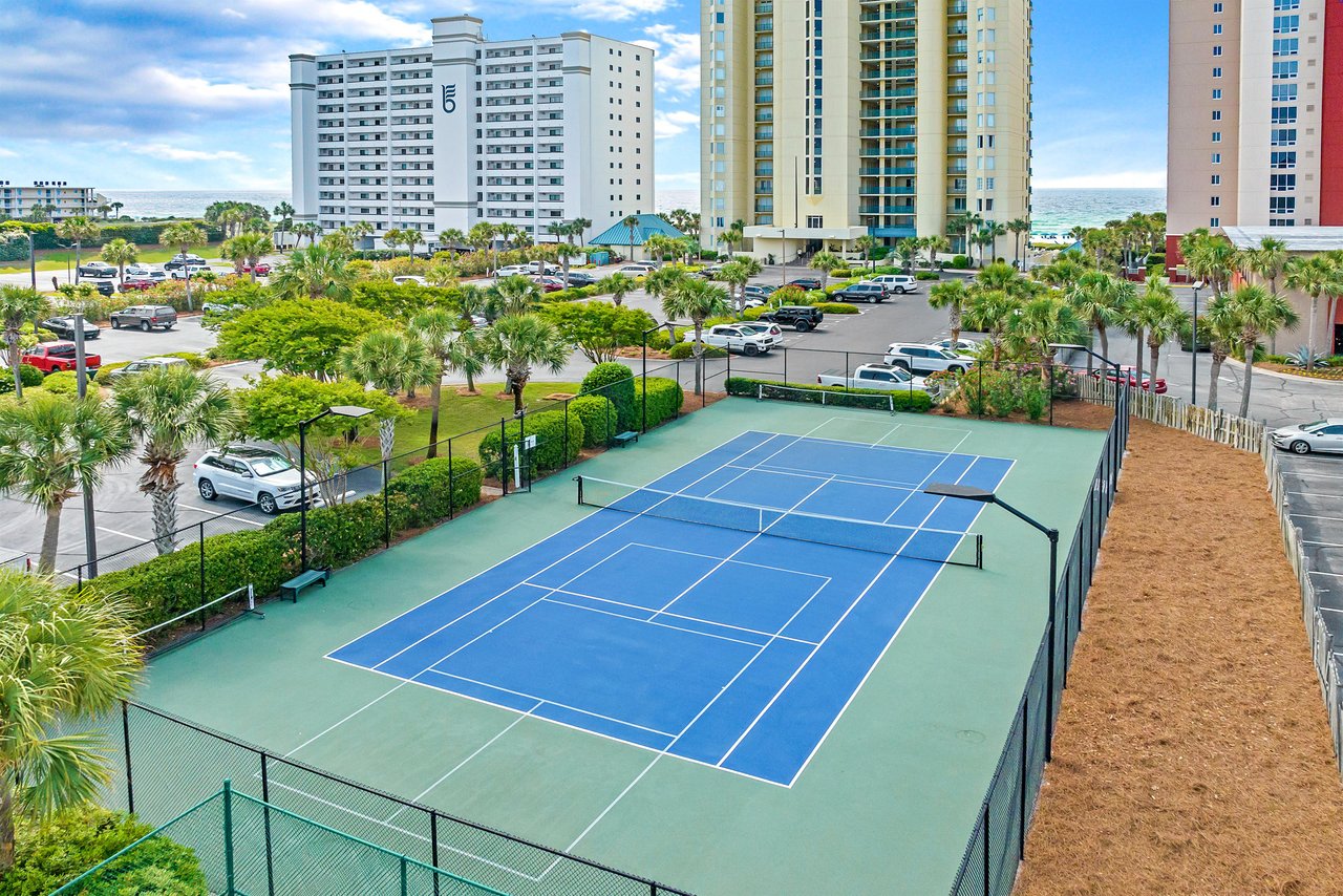 2121164 A Tennis Court In A City