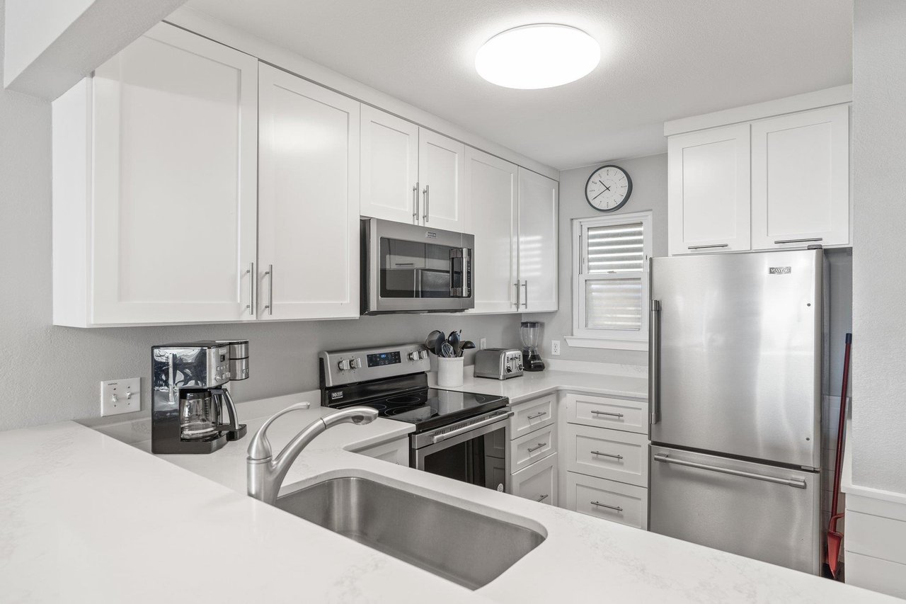 Fully Equipped Kitchen with Stainless Steel Appliances