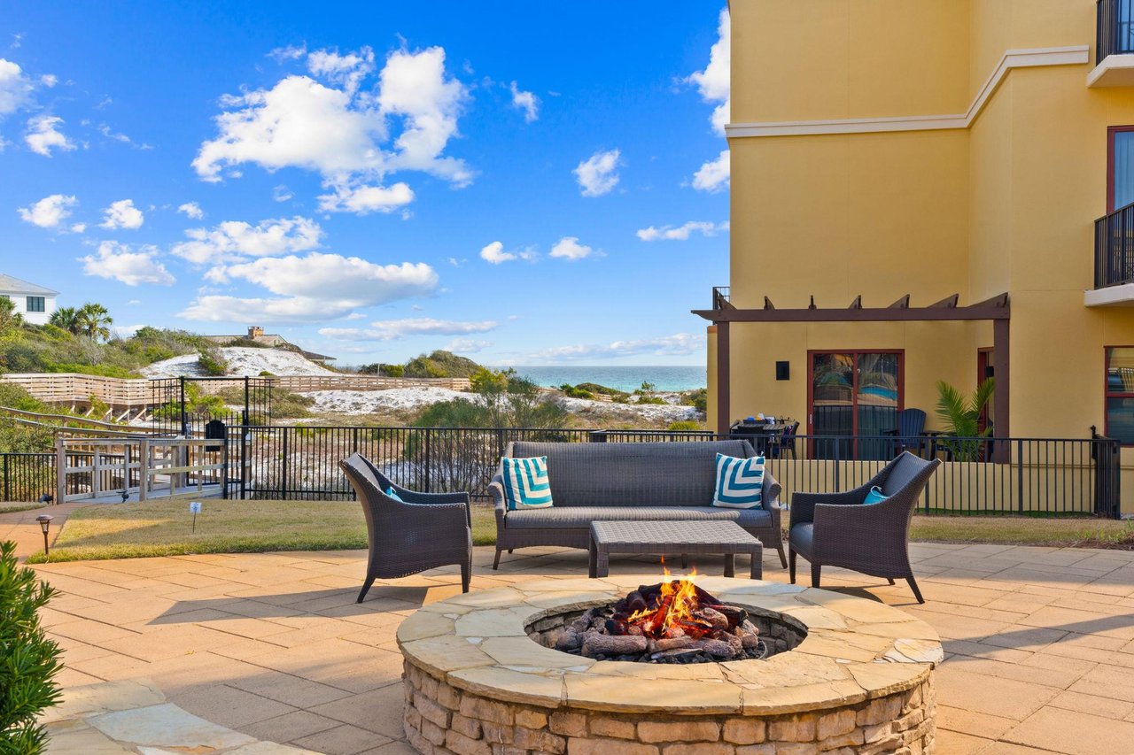 2191186 A Patio With Chairs And A Table