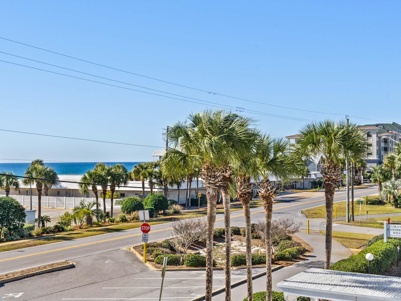 Gulf views and palmlined streets create a perfect coastal neighborhood setting just steps from the beach.