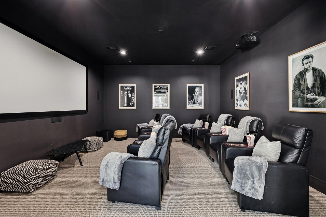 Sink into plush seating in your private cinema room, complete with vintage movie posters and theaterstyle seating for memorable movie nights.