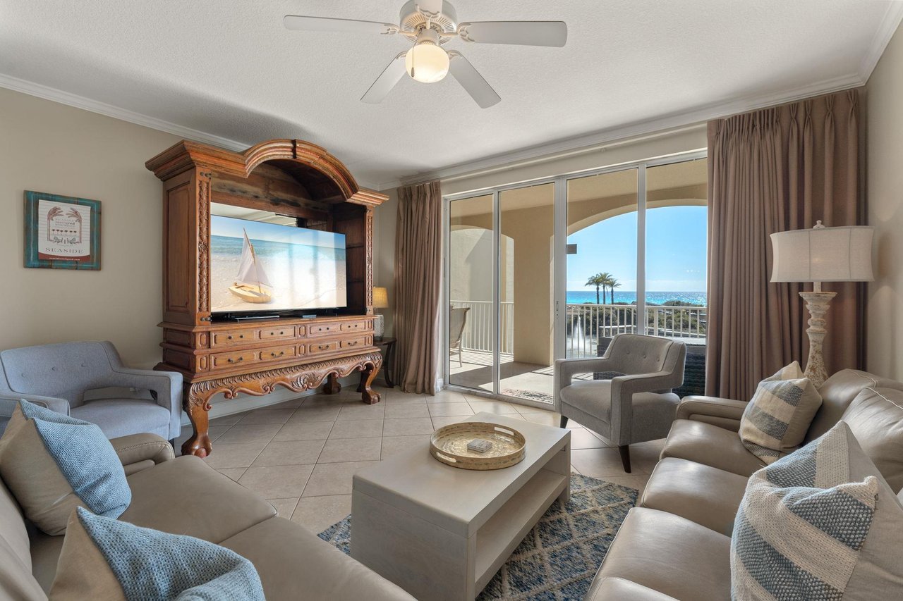 Relax in this elegant living room with ocean views from the private balcony.