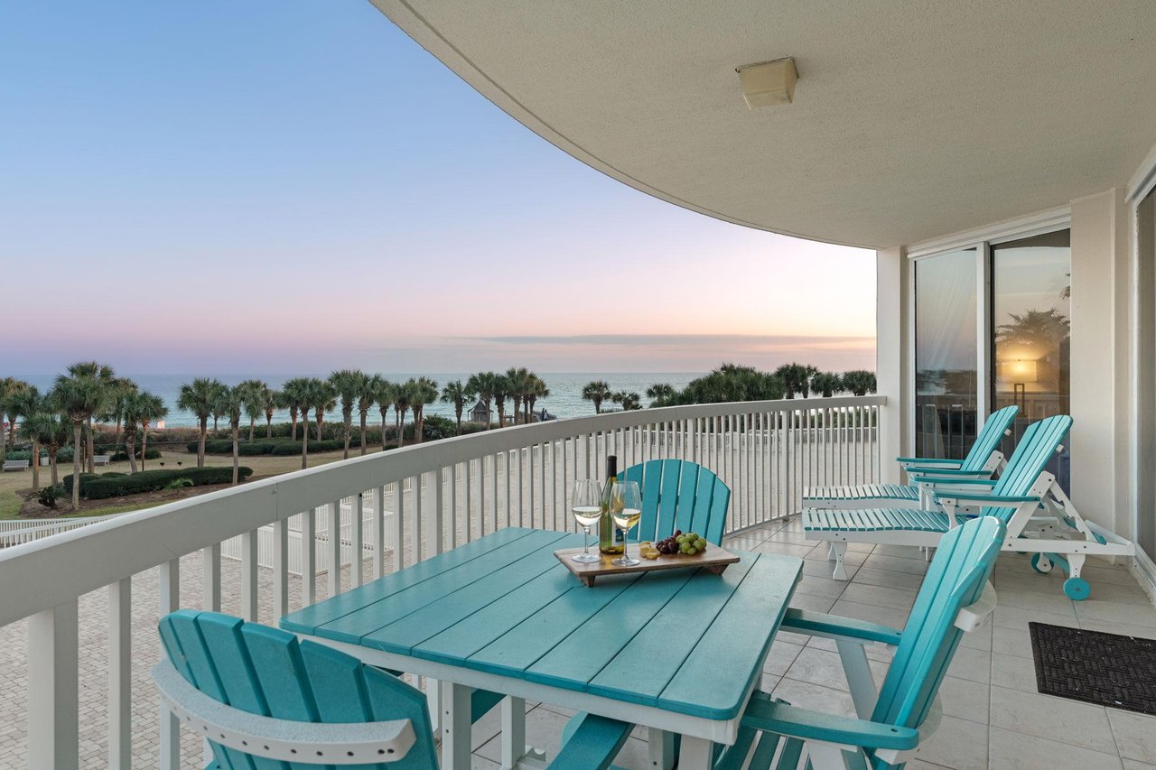 Sip your morning coffee on this oceanfront balcony as gentle breezes and stunning sea views create the perfect backdrop for relaxation.