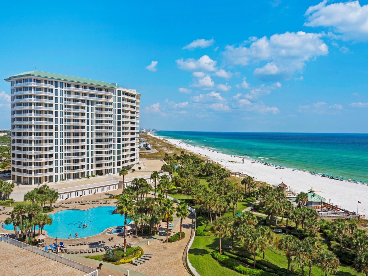 Bask in the sun from your spacious balcony with big views of the pool, beach and green space.
