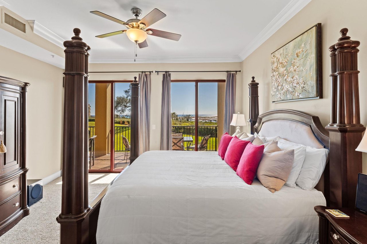 Primary Bedroom with King Bed, Gulf Views and Private Balcony Access.