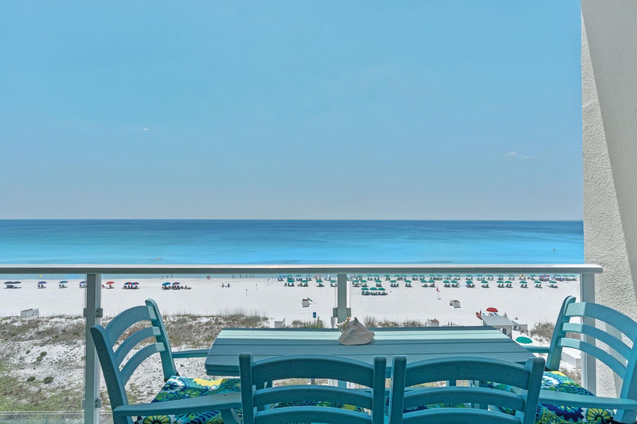 Relax with cocktail or meal on the Private Gulf front balcony