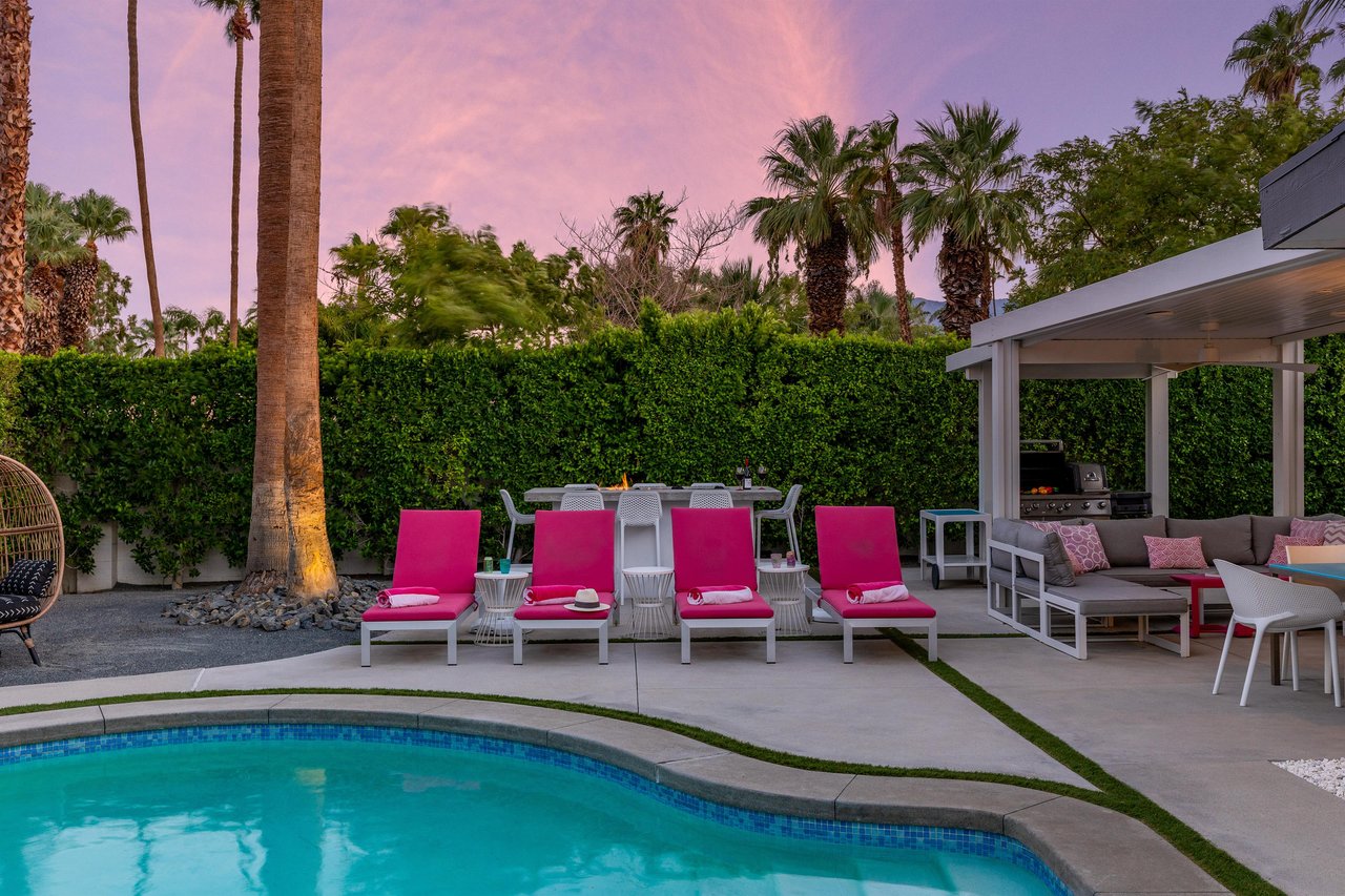 Four Pink Inviting Pool Loungers