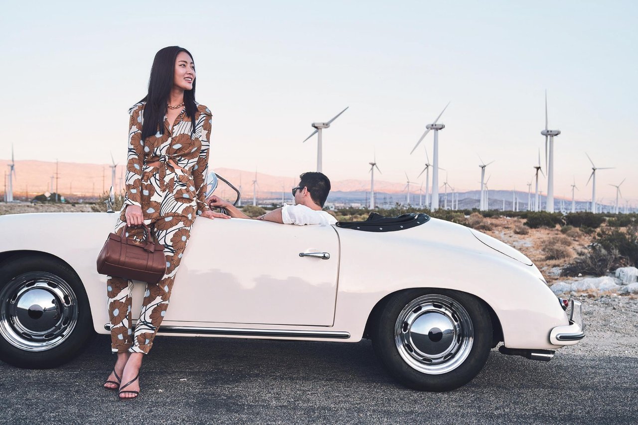 400055 Woman Posing In Front Of Vintage Car
