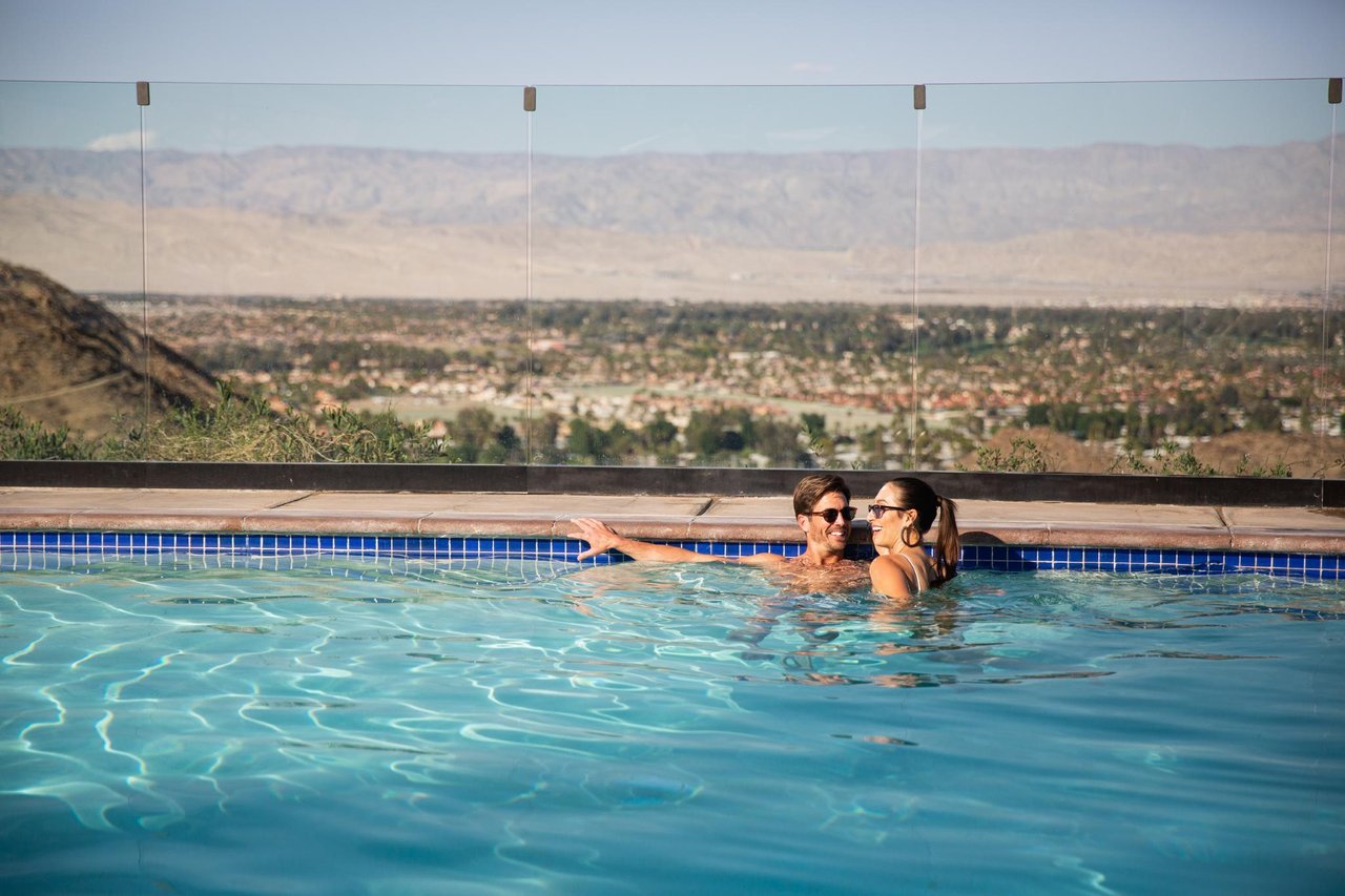 412405 Enjoying Pool Time  At Palm Springs Vacation Rentals