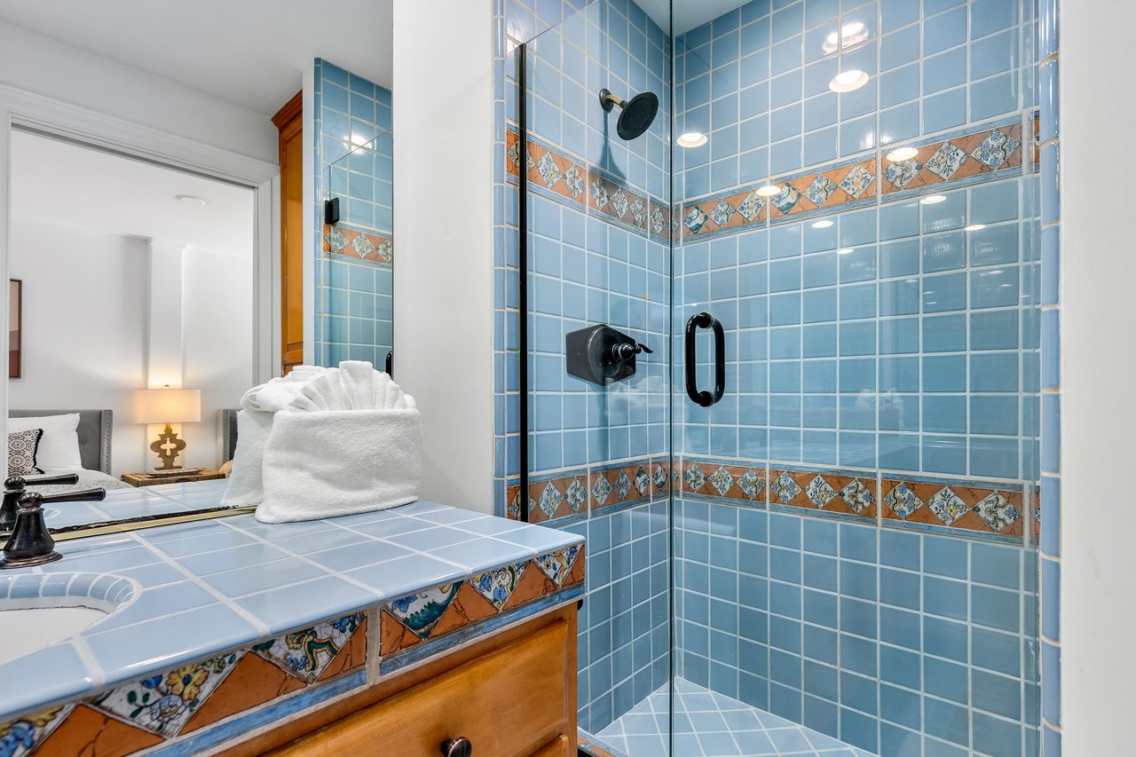 Guest shower tiled in sky blue