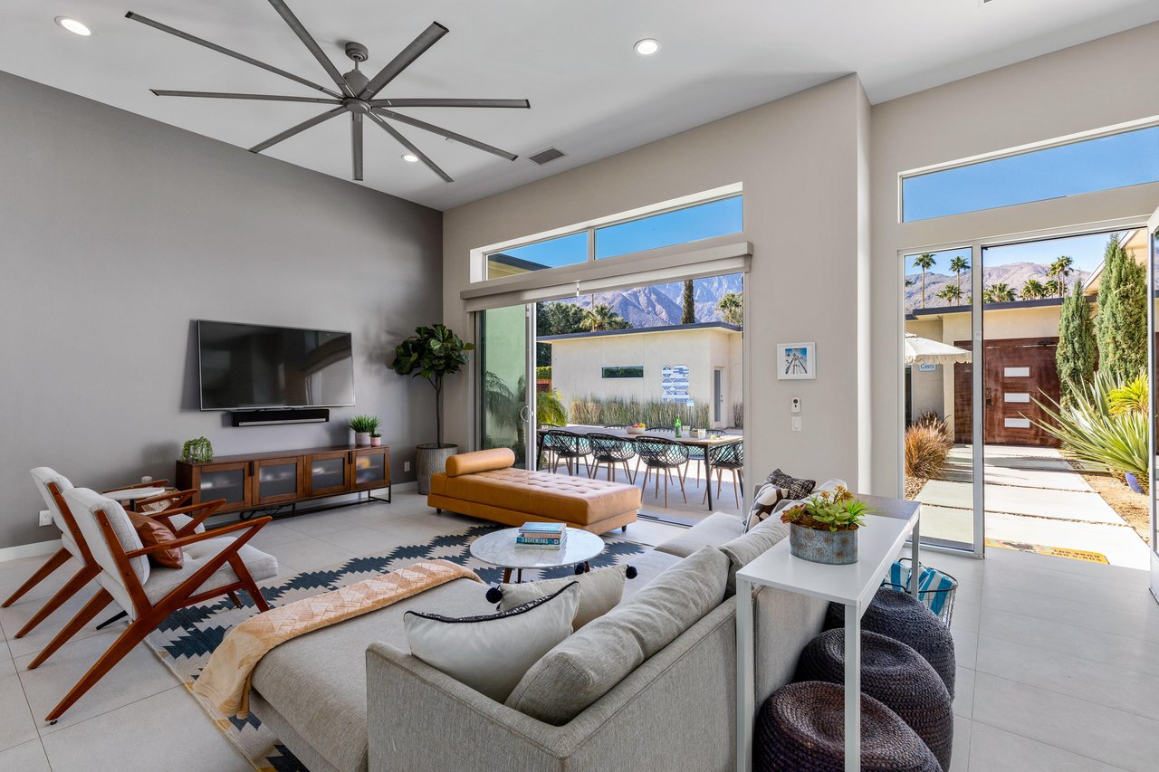 Wall to wall windows let in the Palm Springs light