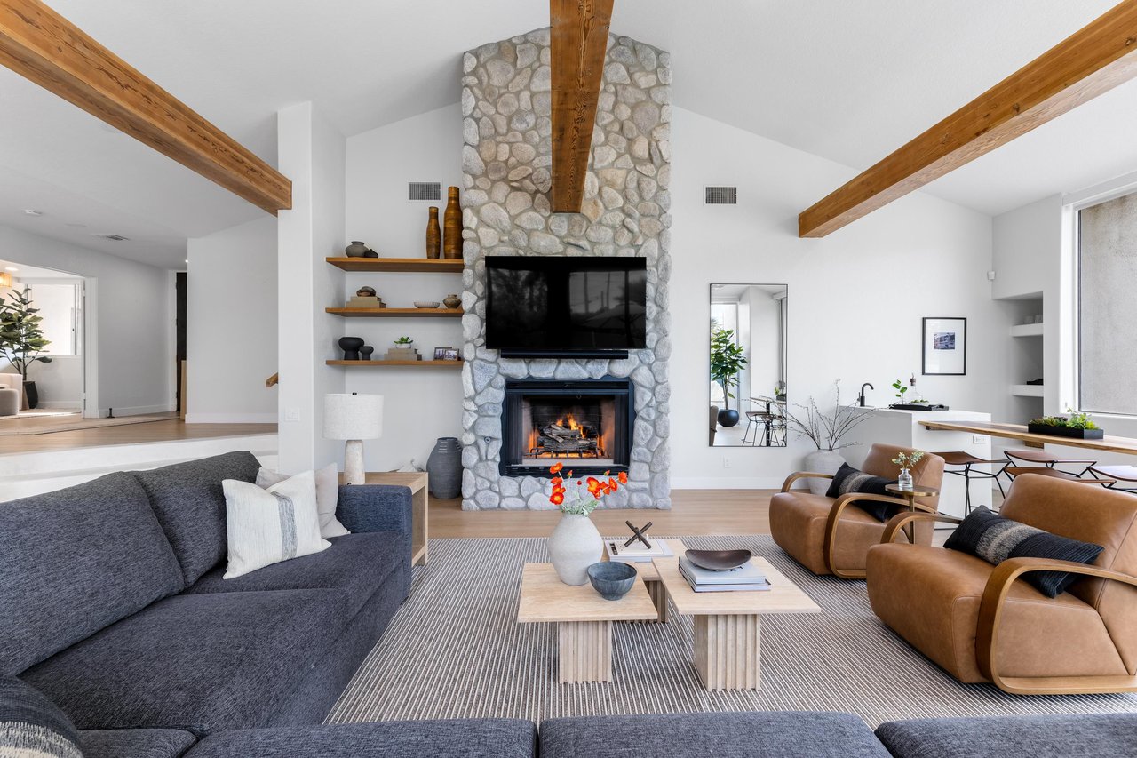 Comfy couches and lounge chairs for quiet conversations around the fire