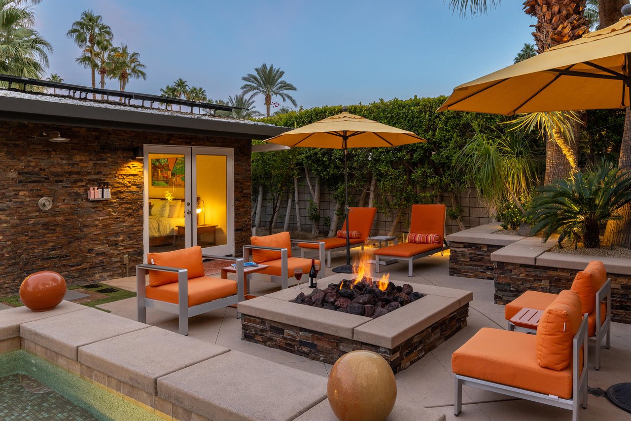 Gather around the firepit for some gossip and a glass of wine