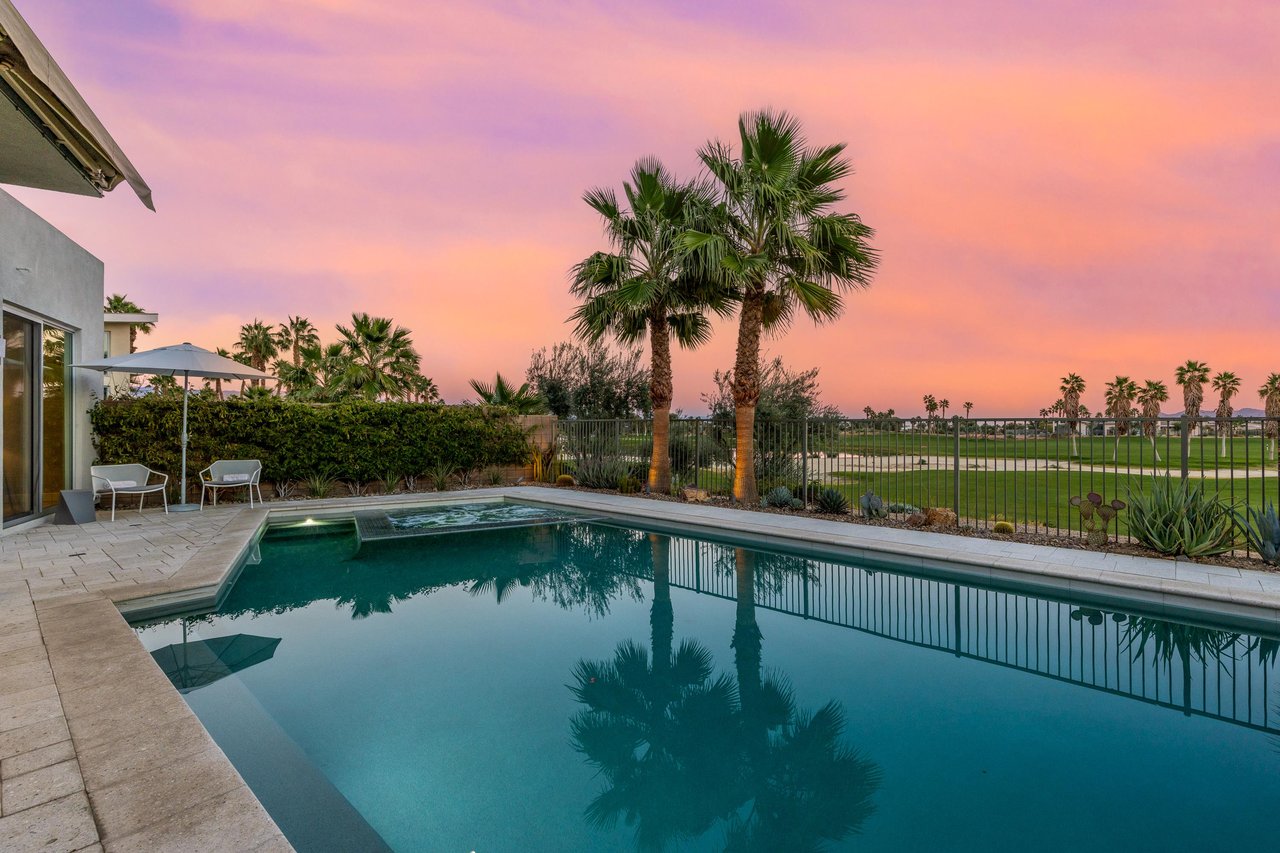 Flawless pool deck with mature landscaping