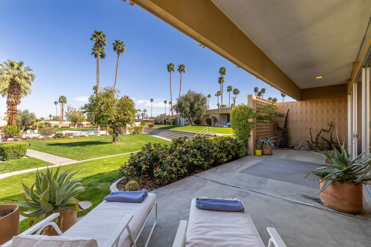 Lounge chairs underneath covered patio