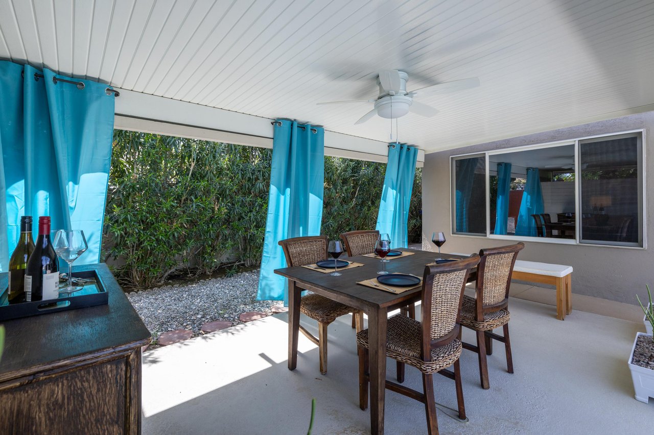 Covered al fresco dining and lounge area