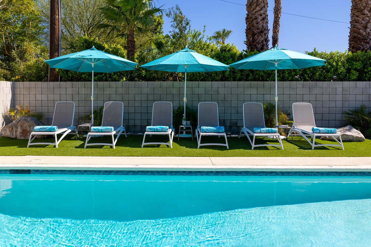 Tons of lounge chairs and umbrellas