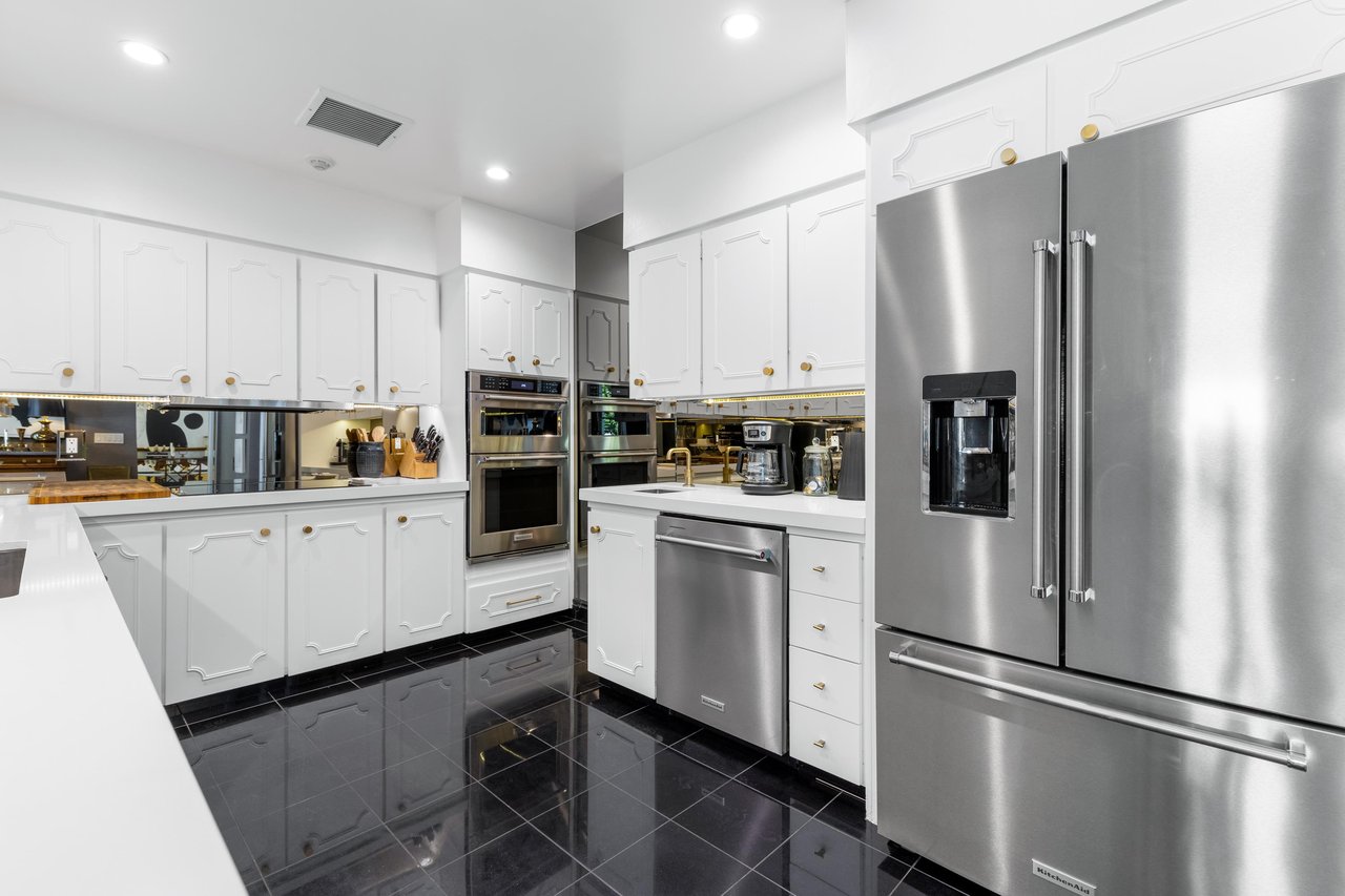 Dramatic black  white Chefs kitchen