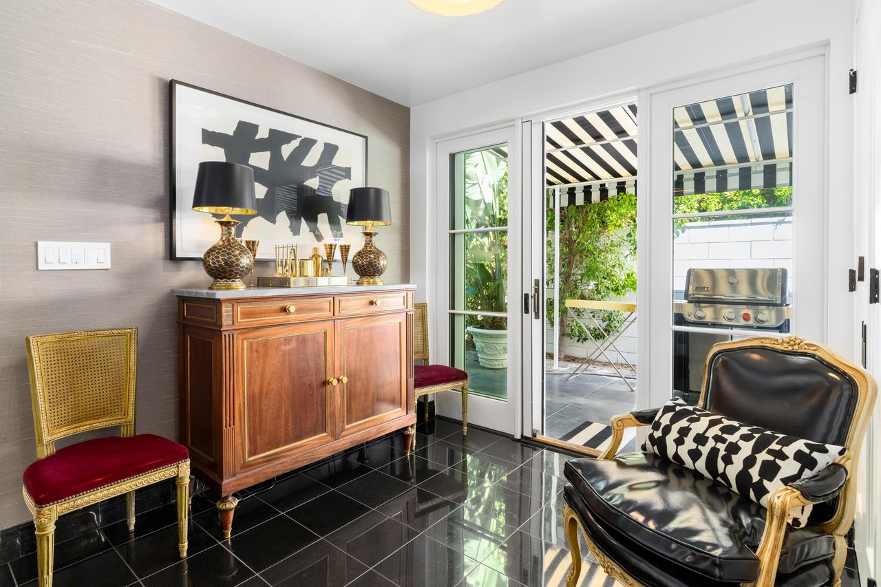 Kitchen side pantry and seating area