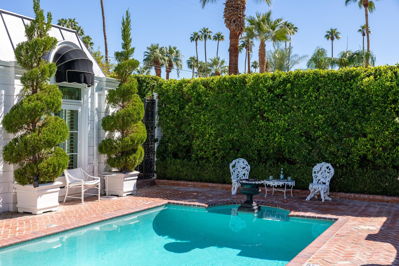 Seating area for a drink at the end of the pool