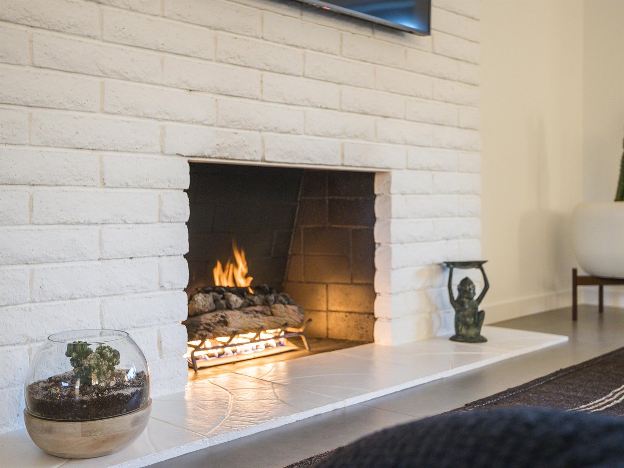 Get cozy by the fireplace