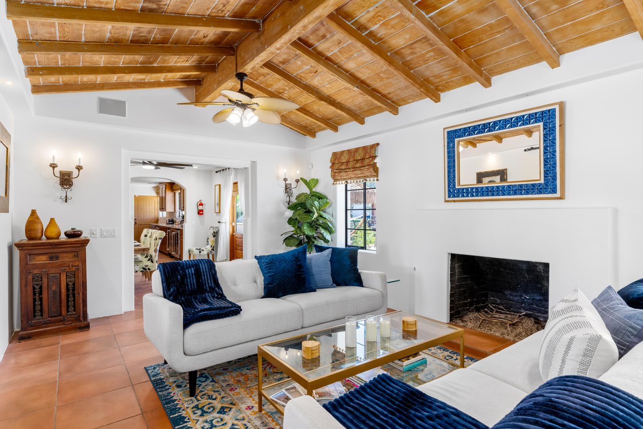 Formal living room with a fireplace