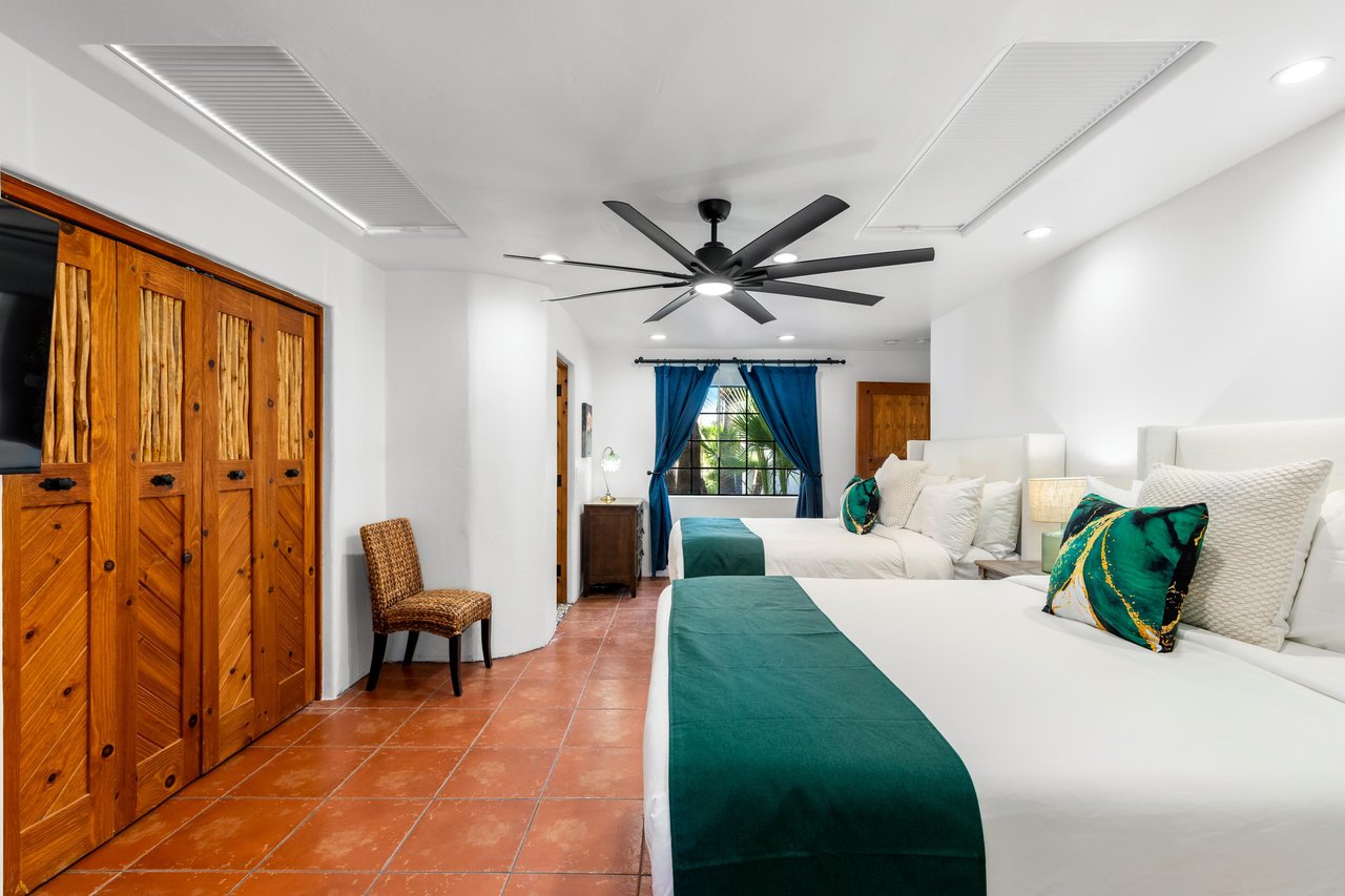 Guest bedroom with two queen beds