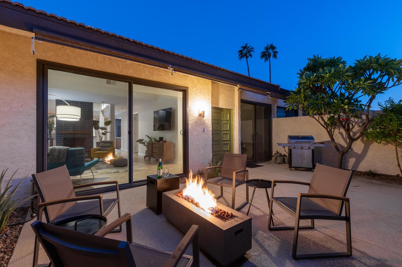 Sit around the fire pit and enjoy your glass of wine